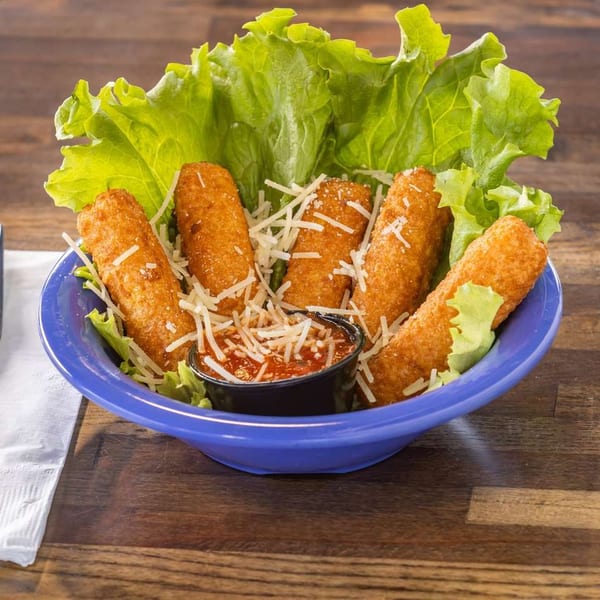 Golden-brown mozzarella sticks with shredded cheese, marinara sauce, and lettuce in a blue bowl.